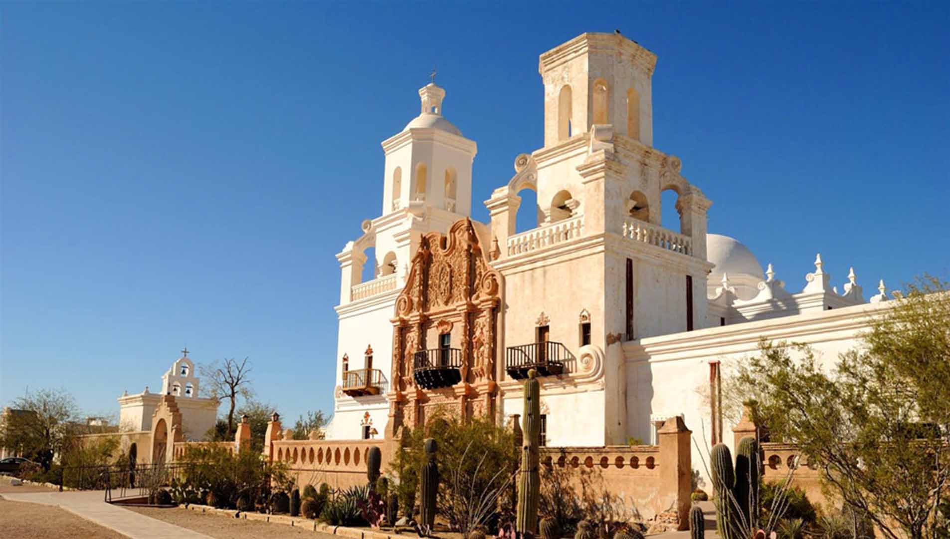The mission San Xavier del Bac, the white dove of the desert. A preserved Spanish colonial chapel.